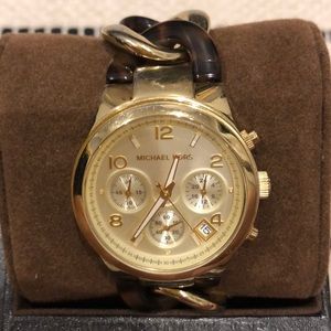 Women’s MK Tortoise/Gold banded watch